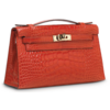 Hermès Kelly Pochette Clutch Rose Extreme Lisse Crocodile Alligator Permabrass